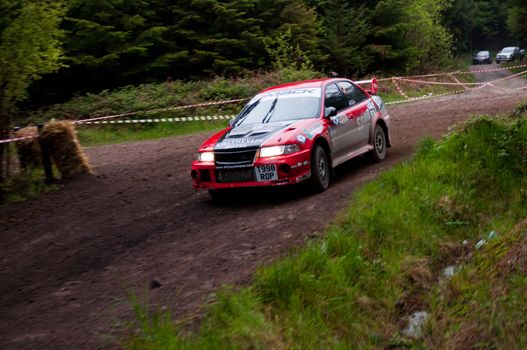 MALLOW, IRELAND - MAY 19: S. Wright driving Mitsubishi Evo at the Jim Walsh Cork Forest Rally on May 19, 2012 in Mallow, Ireland. 4th round of the Valvoline National Forest Rally Championship.