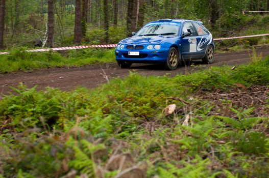 MALLOW, IRELAND - MAY 19: M. Brady driving Rover MG at the Jim Walsh Cork Forest Rally on May 19, 2012 in Mallow, Ireland. 4th round of the Valvoline National Forest Rally Championship.