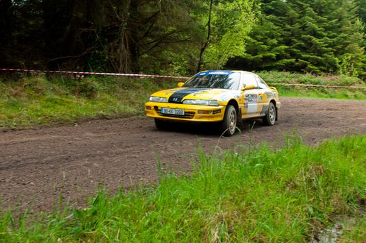 MALLOW, IRELAND - MAY 19: C. Butler driving Honda Integra at the Jim Walsh Cork Forest Rally on May 19, 2012 in Mallow, Ireland. 4th round of the Valvoline National Forest Rally Championship.