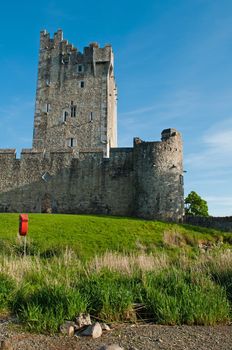 stunning Ross Castle in Killarney (County Kerry), Ireland (blue sky background)