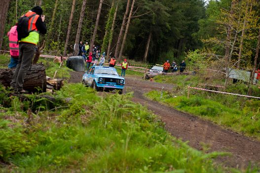 MALLOW, IRELAND - MAY 19: J. Coleman driving Ford Escort at the Jim Walsh Cork Forest Rally on May 19, 2012 in Mallow, Ireland. 4th round of the Valvoline National Forest Rally Championship.