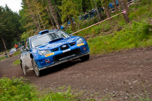 MALLOW, IRELAND - MAY 19: M. Cairns driving Subaru Impreza at the Jim Walsh Cork Forest Rally on May 19, 2012 in Mallow, Ireland. 4th round of the Valvoline National Forest Rally Championship.