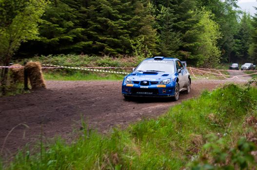 MALLOW, IRELAND - MAY 19: M. Cairns driving Subaru Impreza at the Jim Walsh Cork Forest Rally on May 19, 2012 in Mallow, Ireland. 4th round of the Valvoline National Forest Rally Championship.