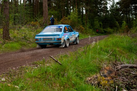 MALLOW, IRELAND - MAY 19: J. Coleman driving Ford Escort at the Jim Walsh Cork Forest Rally on May 19, 2012 in Mallow, Ireland. 4th round of the Valvoline National Forest Rally Championship.