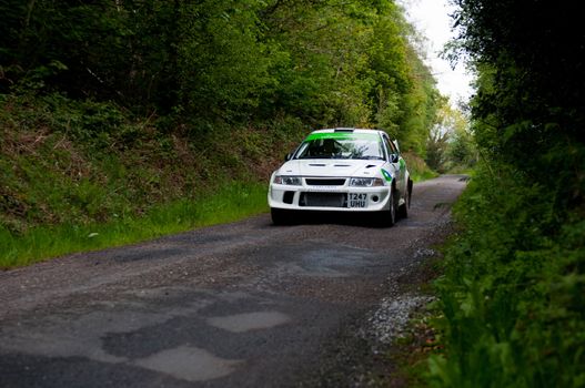 MALLOW, IRELAND - MAY 19: J. Laverty driving Mitsubishi Evo at the Jim Walsh Cork Forest Rally on May 19, 2012 in Mallow, Ireland. 4th round of the Valvoline National Forest Rally Championship.