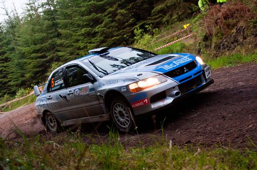 MALLOW, IRELAND - MAY 19: V. Mcaree driving Mitsubishi Evo at the Jim Walsh Cork Forest Rally on May 19, 2012 in Mallow, Ireland. 4th round of the Valvoline National Forest Rally Championship.