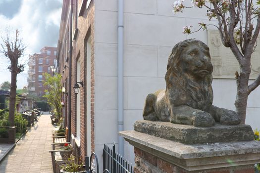 A statue of a lion near a house in Gorinchem. Netherlands