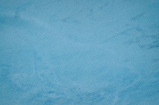 Blue ceramic wall tile closeup texture.