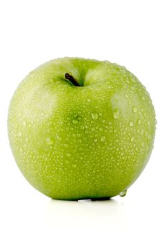 Closeup of green apple on white background.