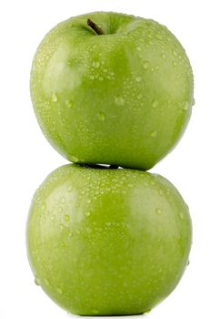 Two fresh green apples on white background.