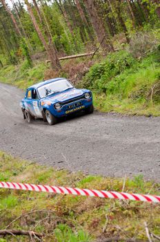 MALLOW, IRELAND - MAY 19: M. Sheahan driving Ford Escort at the Jim Walsh Cork Forest Rally on May 19, 2012 in Mallow, Ireland. 4th round of the Valvoline National Forest Rally Championship.