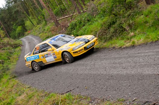 MALLOW, IRELAND - MAY 19: C. Butler driving Honda Integra at the Jim Walsh Cork Forest Rally on May 19, 2012 in Mallow, Ireland. 4th round of the Valvoline National Forest Rally Championship.