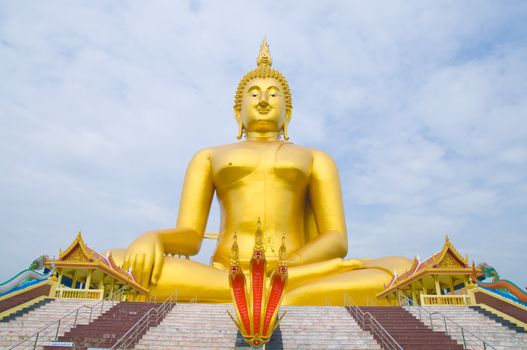 Golden Buddha statue at Wat Muang temple in Angthong, Thailand