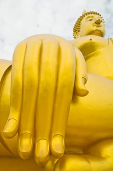 Golden Buddha statue at Wat Muang temple in Angthong, Thailand