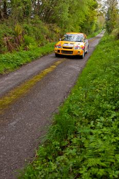 MALLOW, IRELAND - MAY 19: P. Barrett driving Mitsubishi Evo at the Jim Walsh Cork Forest Rally on May 19, 2012 in Mallow, Ireland. 4th round of the Valvoline National Forest Rally Championship.