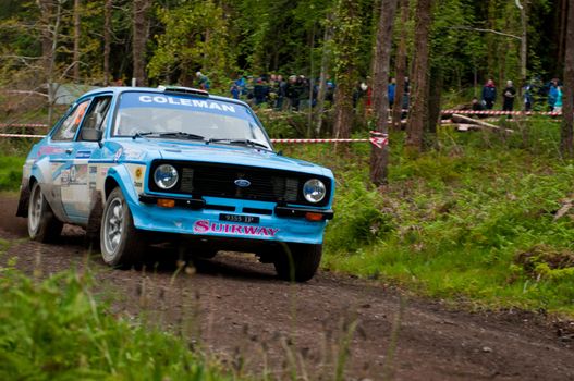 MALLOW, IRELAND - MAY 19: J. Coleman driving Ford Escort at the Jim Walsh Cork Forest Rally on May 19, 2012 in Mallow, Ireland. 4th round of the Valvoline National Forest Rally Championship.