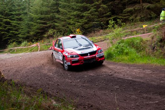 MALLOW, IRELAND - MAY 19: Stage Winner O. Murphy driving Mitsubishi Evo at the Jim Walsh Cork Forest Rally on May 19, 2012 in Mallow, Ireland. 4th round of the Valvoline Forest Rally Championship.