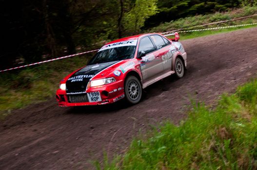 MALLOW, IRELAND - MAY 19: S. Wright driving Mitsubishi Evo at the Jim Walsh Cork Forest Rally on May 19, 2012 in Mallow, Ireland. 4th round of the Valvoline National Forest Rally Championship.