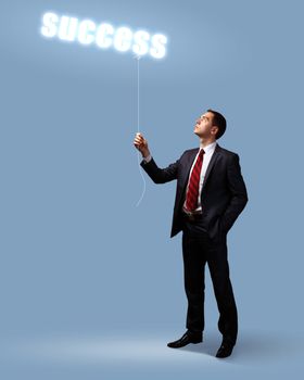 Light bulb and a business person as symbols of creativity in business