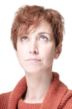 smiling short hair girl cold with orange sweater on white background