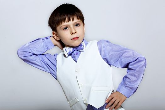 Portrait of a little boy dressed for a celebration