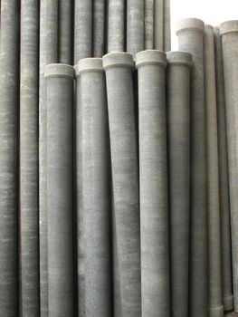 Stack of many asbestos pipes
