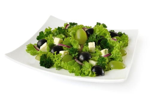 Salad of lettuce with cheese and grapes of different varieties