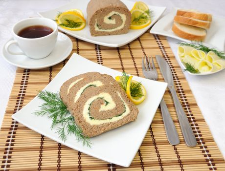 Slices of liver pate with butter and coffee for breakfast

