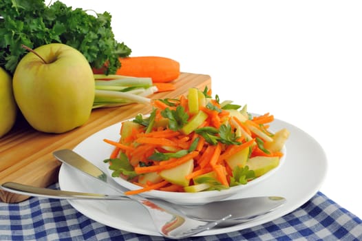 Apple and carrot salad with green onions and parsley