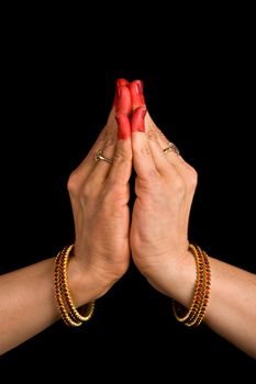 Woman hands showing Kapota hasta of indian classic dance Bharata Natyam