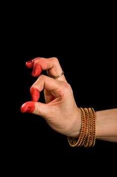 Woman hand showing Palli hasta (meaning "Lizard") of indian classic dance Bharata Natyam