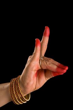 Woman hand showing Simhamukha hasta  (hand gesture, also called mudra)(meaning "Lion face") of indian classic dance Bharata Natyam. Also used in Indian dances Odissi and Kuchipudi.