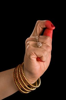 Woman hand showing Kapittha hasta (hand gesture, also called mudra) (meaning "Godess Lakshmi") of indian classic dance Bharata Natyam. Also used in Indian dances Odissi and Kuchipudi.
kapittha Godess Lakshmi