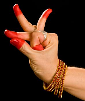 Woman hand showing Bhramara (Brahmara) hasta  (hand gesture, also called mudra) (meaning "Bee") of indian classic dance Bharata Natyam. Also used in other indian classical dances Kuchipudi and Odissi.