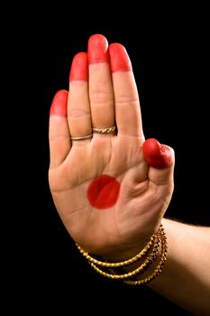 Woman hand showing Pataka hasta (meaning flag) of indian classic dance Bharata Natyam