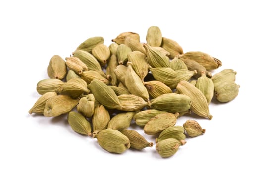 Pile of cardamom isolated on white background close up