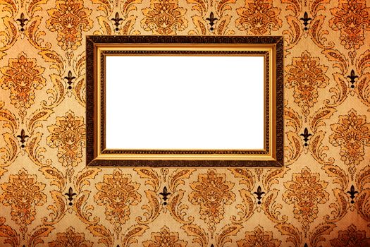 Vintage gold plated picture frame  on retro wallpaper background