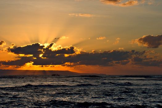 Calm peaceful ocean and beach on tropical sunrise