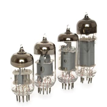 Old vacuum tubes on white background