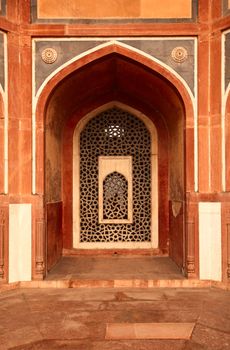 Arch with carved marble window. Mughal style.  Humayun's tomb, Delhi