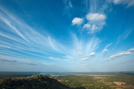 Sky above small mountains, covered with trees. Sri Lanka