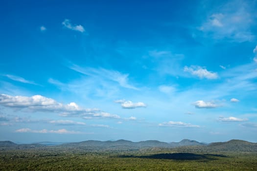 Sky above small mountains, covered with trees. Sri Lanka