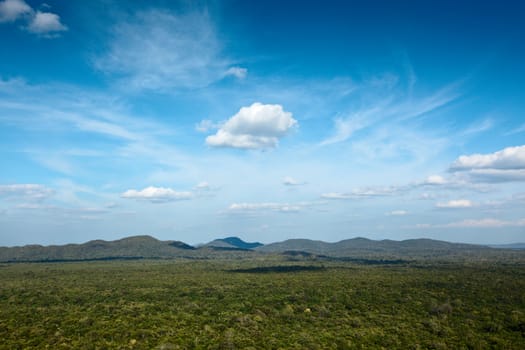 Sky above small mountains, covered with trees. Sri Lanka