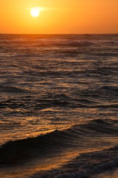 Ocean sunset  with large sun