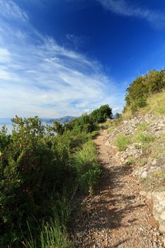 footpath between mountain and sea in Portofino natural park, Italy