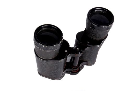 A set of vintage binoculars, isolated on white background.