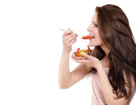 young happy woman eating salad on white background