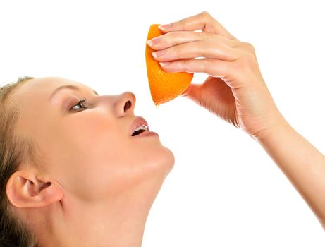 Attractive woman pouring orange juice, isolated on white