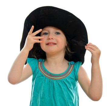 Smiling little girl in hat, isolated on white