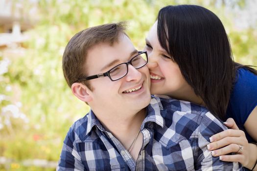 Attractive Young Couple Having Fun Outside in the Park